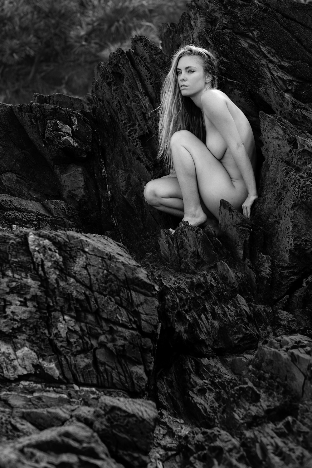 The stunning and ever so lovely @sylviafenwick perched upon the rocks, overlooking the ocean below. From our recent shoot at Broken Head.